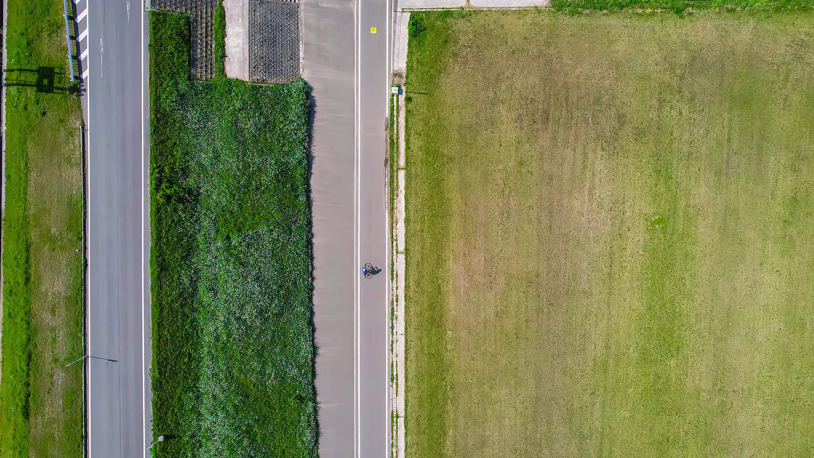Aerial view of a cyclist riding a road bike